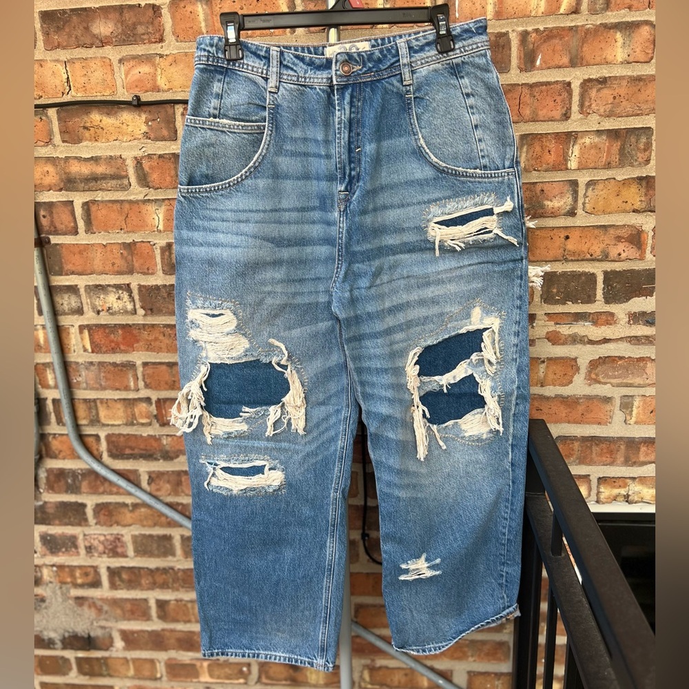 Free people wide legged distressed jeans. Size 30